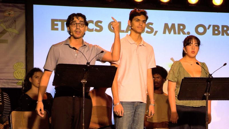 Cast in classroom scene