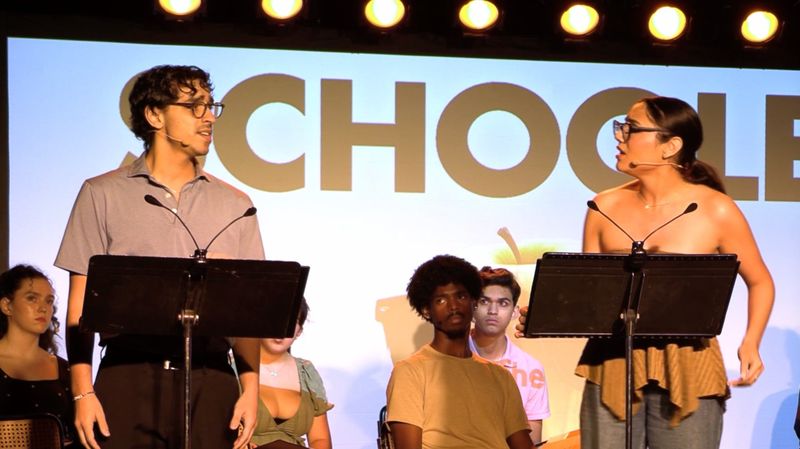 Two leads performing